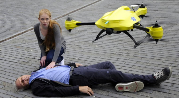 Example of an ambulance drone delivering a defibrillator to a patient in need of urgent care.