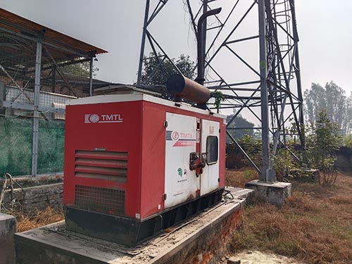 TMTL diesel generator installed at mobile tower site for power supply, telecom infrastructure in remote or urban areas.