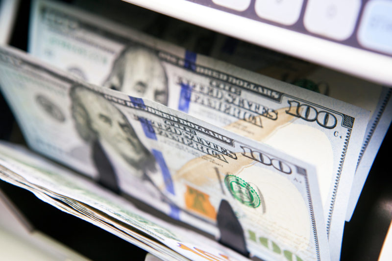 100 dollar bills being counted - cash flow management